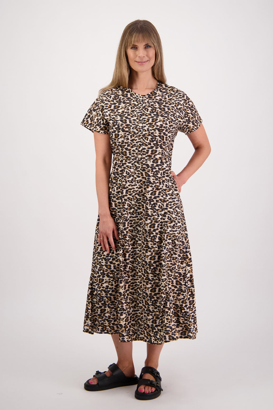 Womens shaped and waisted dress with A-Line skirt, cap sleeves and zip up the back. Briarwood NZ. Cotton Poplin. Leopard Print. Saunders