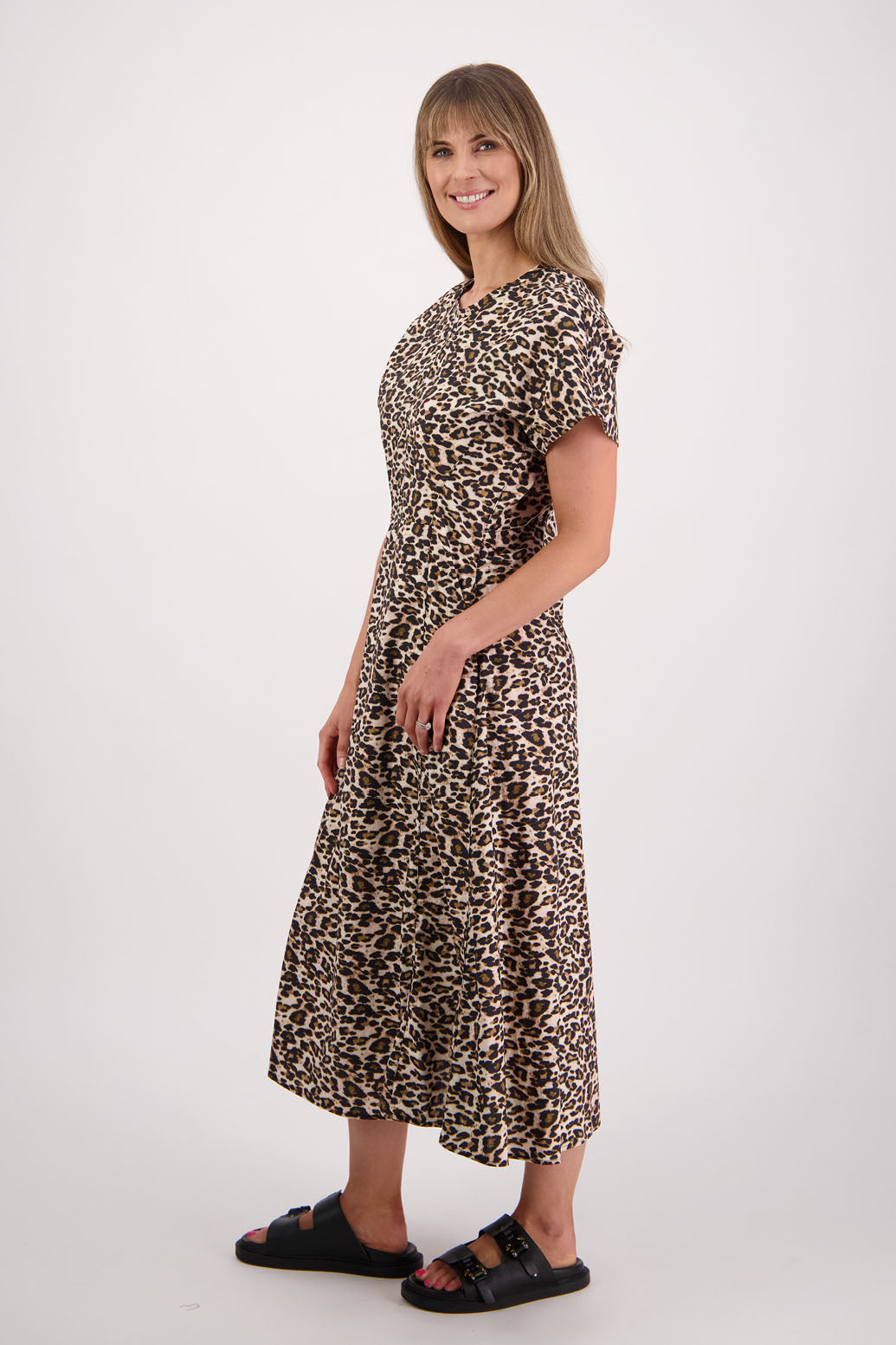 Womens shaped and waisted dress with A-Line skirt, cap sleeves and zip up the back. Briarwood NZ. Cotton Poplin. Leopard Print. Saunders