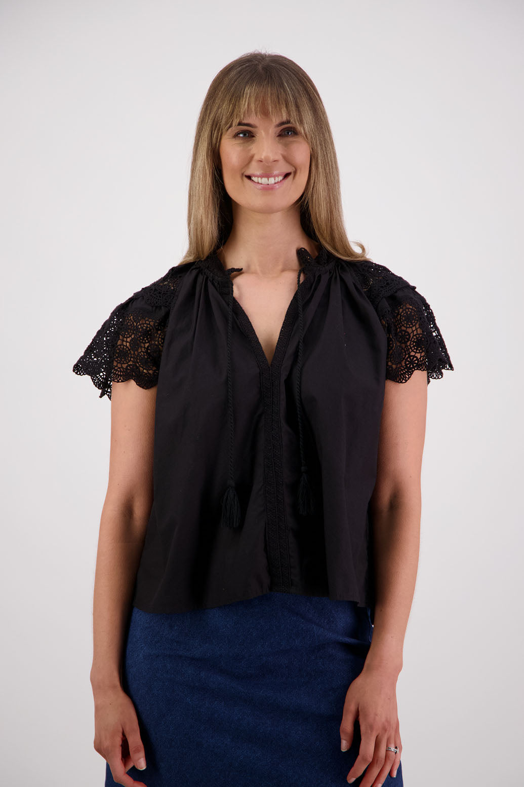 Womens short sleeve black top with lace trim sleeves and lace trim down the front. Briarwood NZ. Cotton Poplin / Lace. Sebbie