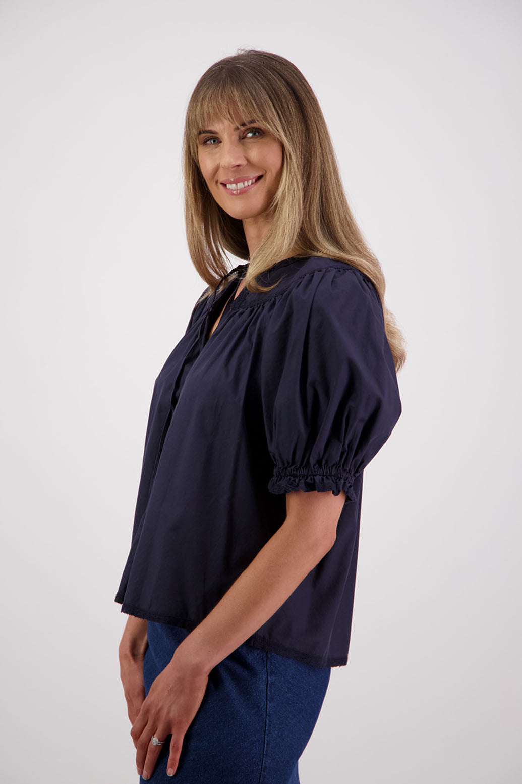 Womens Ink short sleeve top with soft gathering onto yolk with lace trim around the sleeves, hem + yolk. Briarwood NZ. Cotton Poplin / Lace. Selma