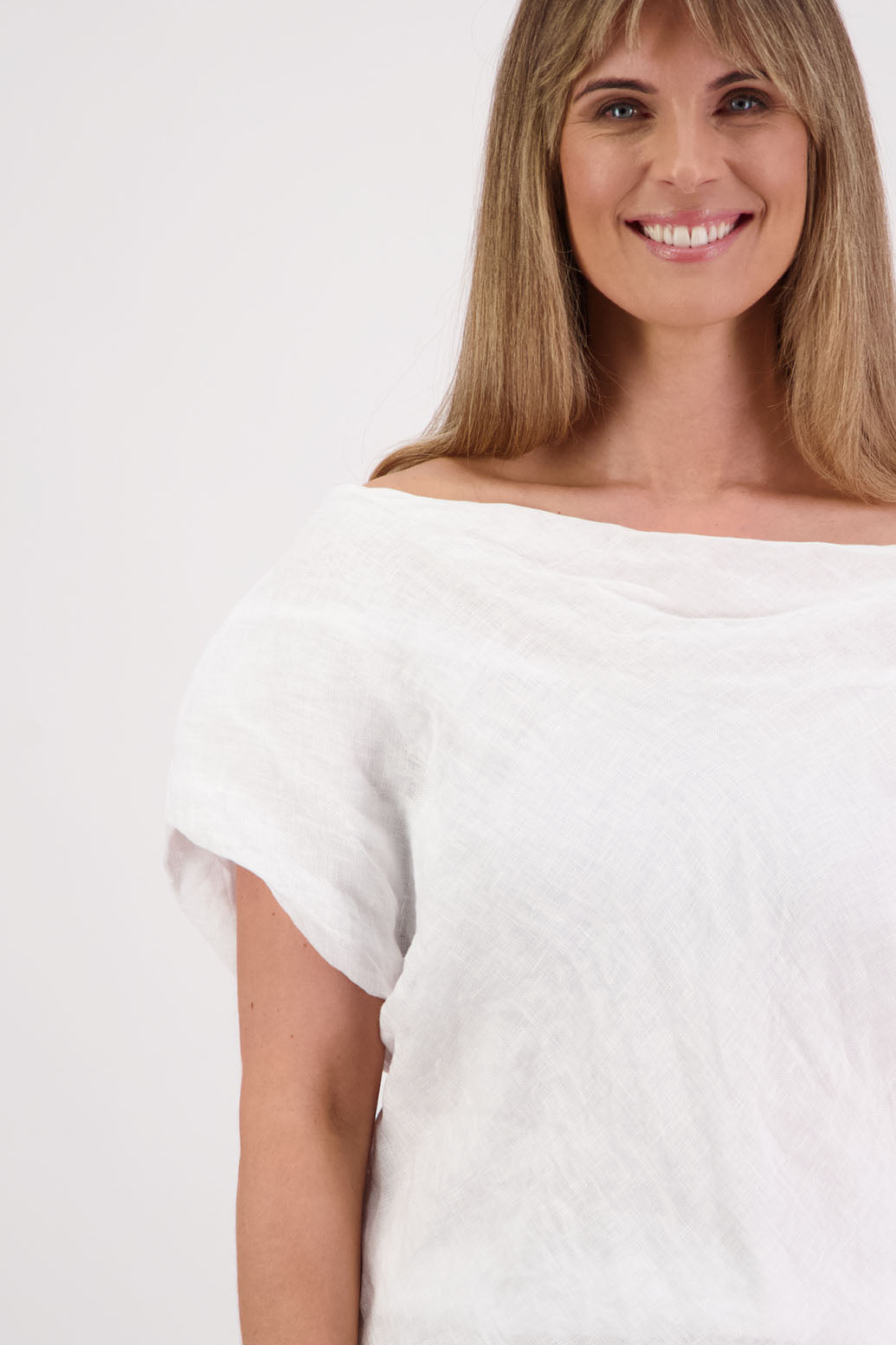 Womens lined, wide neck top that can be worn off the shoulder. Elastic panels around neckline. Linen Gauze. Briarwood NZ. Shelby, White