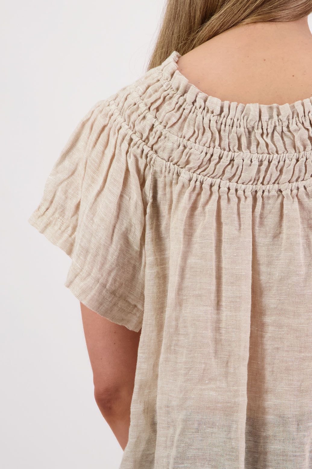Womens longline linen top with short sleeves and elastic panels around neckline. Briarwood NZ. Shelley, Natural