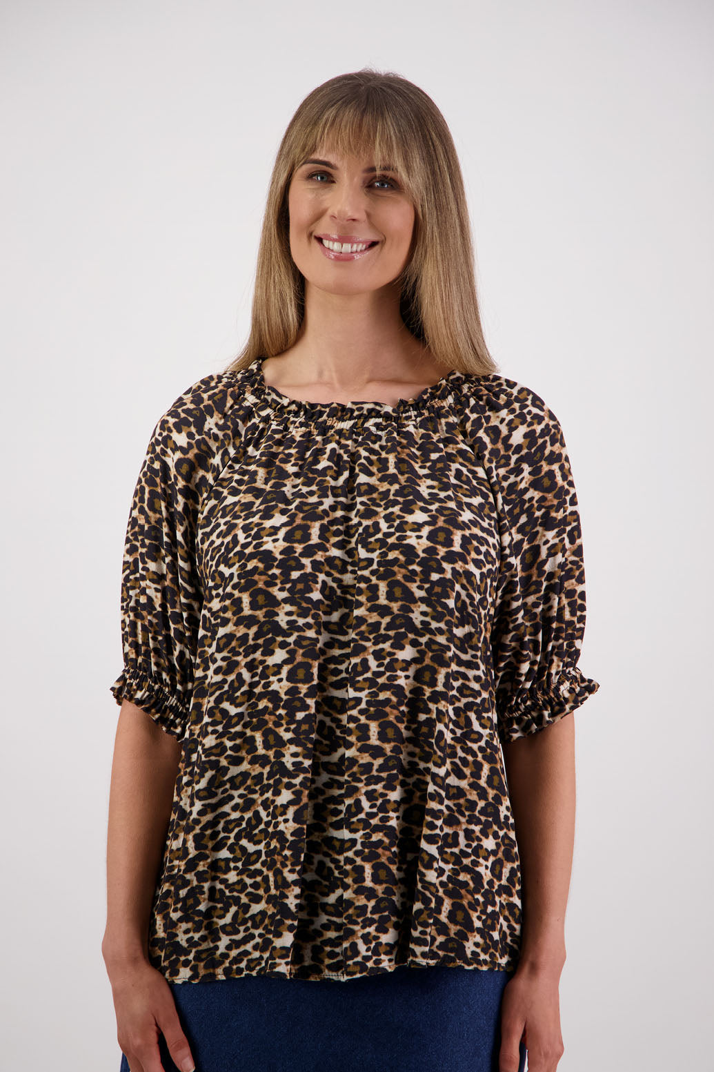 Womens longline viscose top with elbow length sleeves and elasticated neck and sleeves with slight ruffle. Briarwood NZ. Simone. Leopard Print