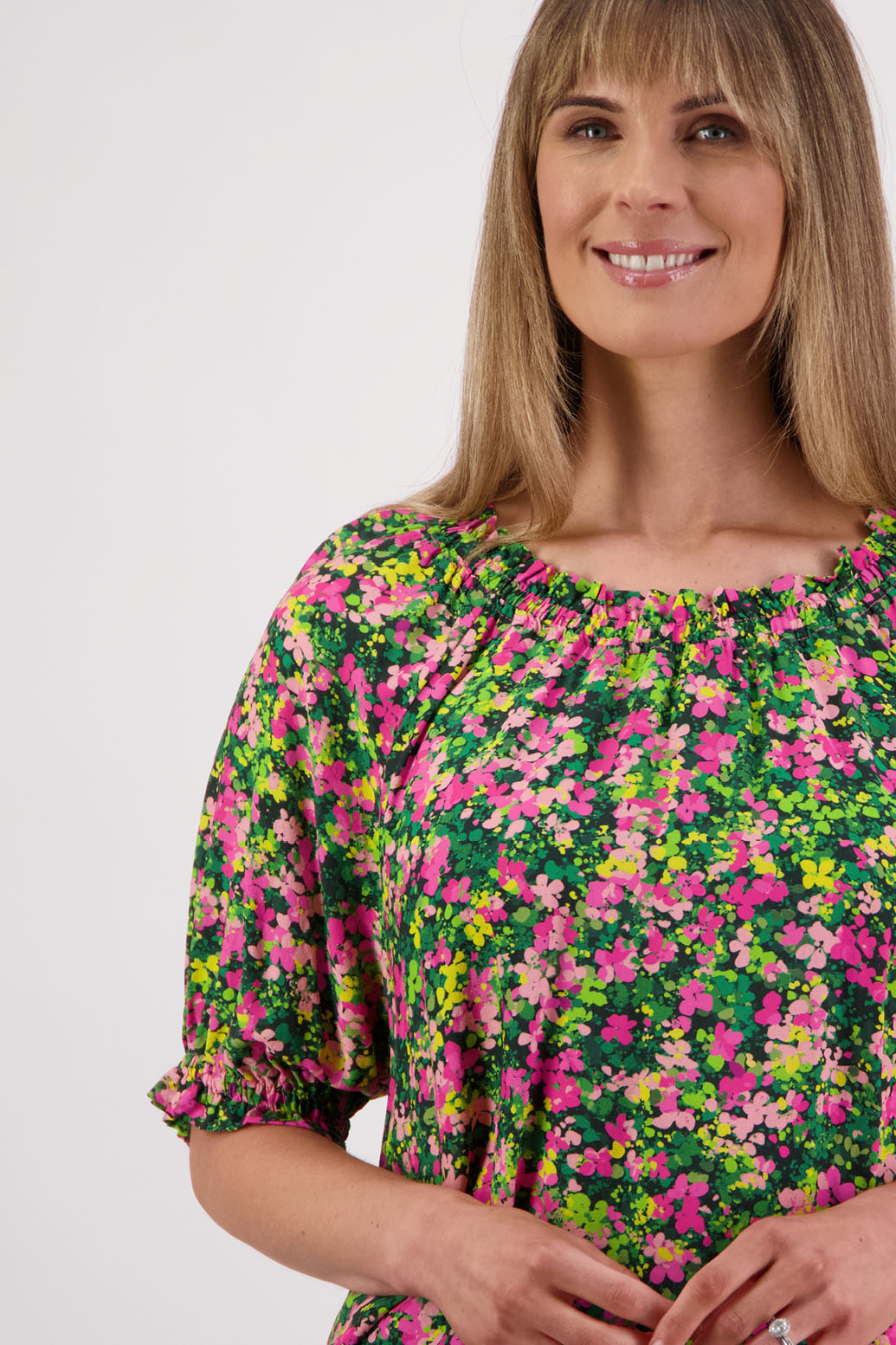 Womens longline viscose top with elbow length sleeves and elasticated neck and sleeves with slight ruffle. Briarwood NZ. Simone. Pansy Print