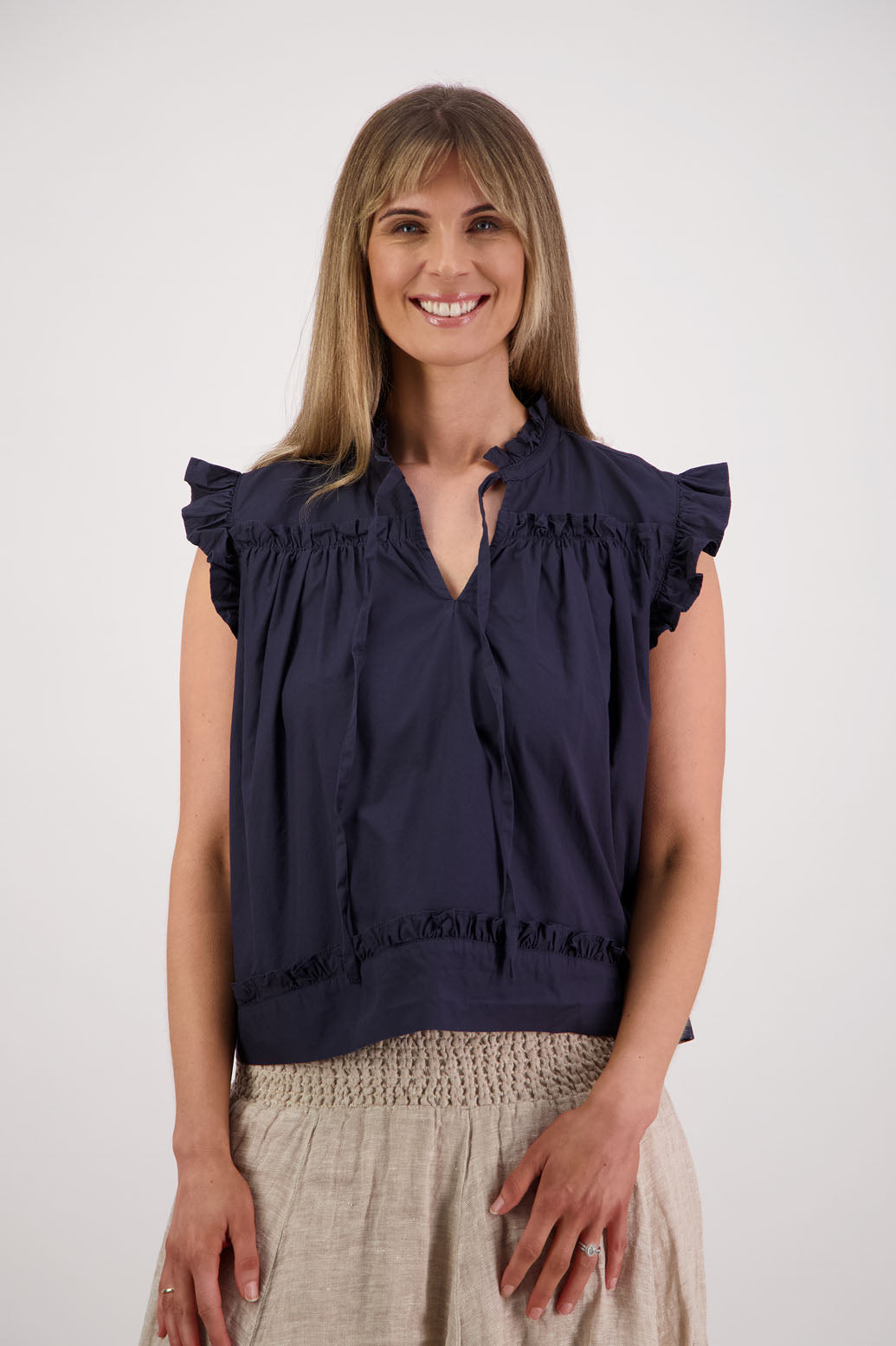 Womens Ink/Navy short sleeve wide top with V neck + tie, and small ruffle on the yolk, hem and sleeves. Briarwood NZ. Cotton Poplin. Skye