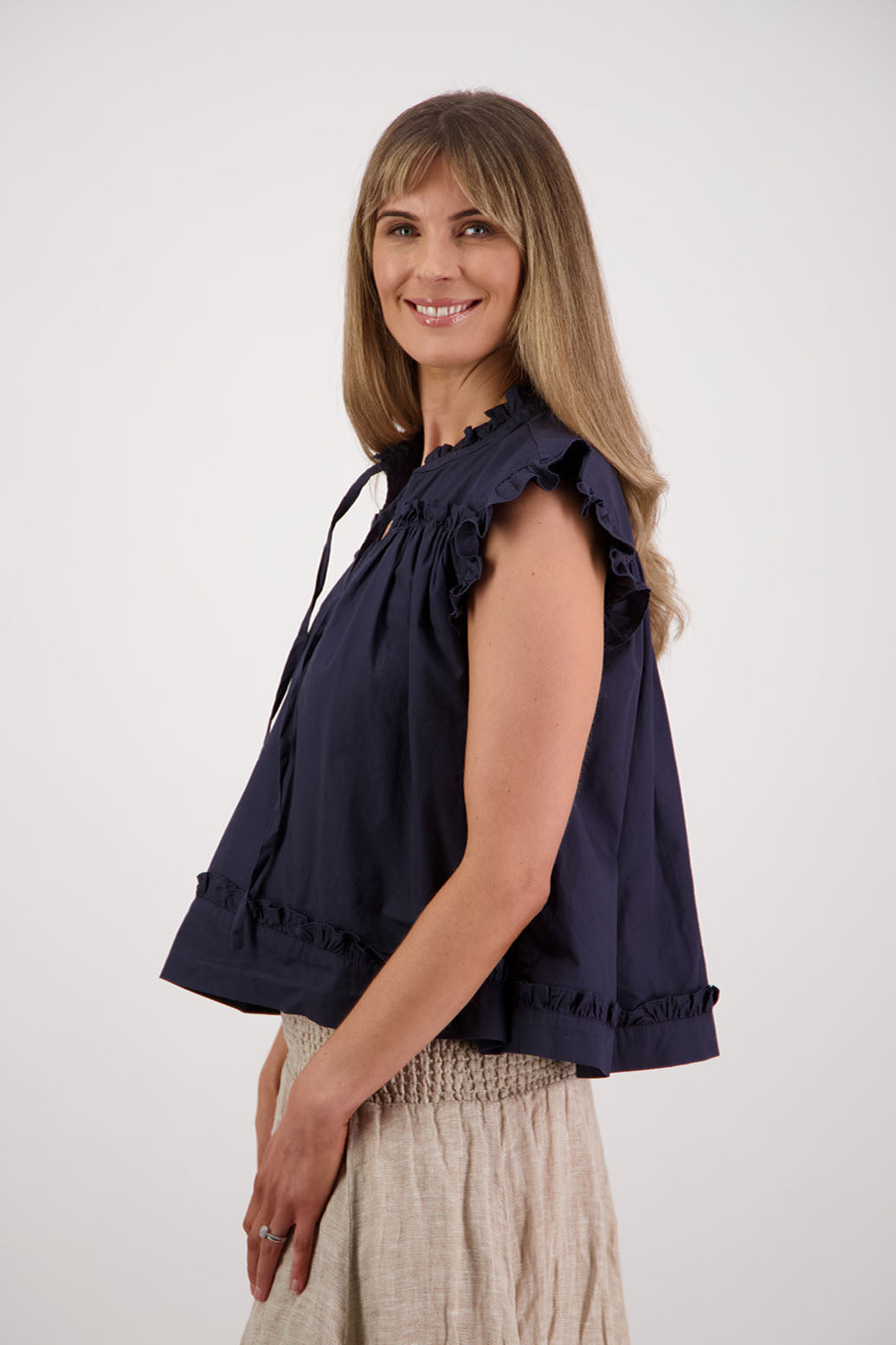 Womens Ink/Navy short sleeve wide top with V neck + tie, and small ruffle on the yolk, hem and sleeves. Briarwood NZ. Cotton Poplin. Skye