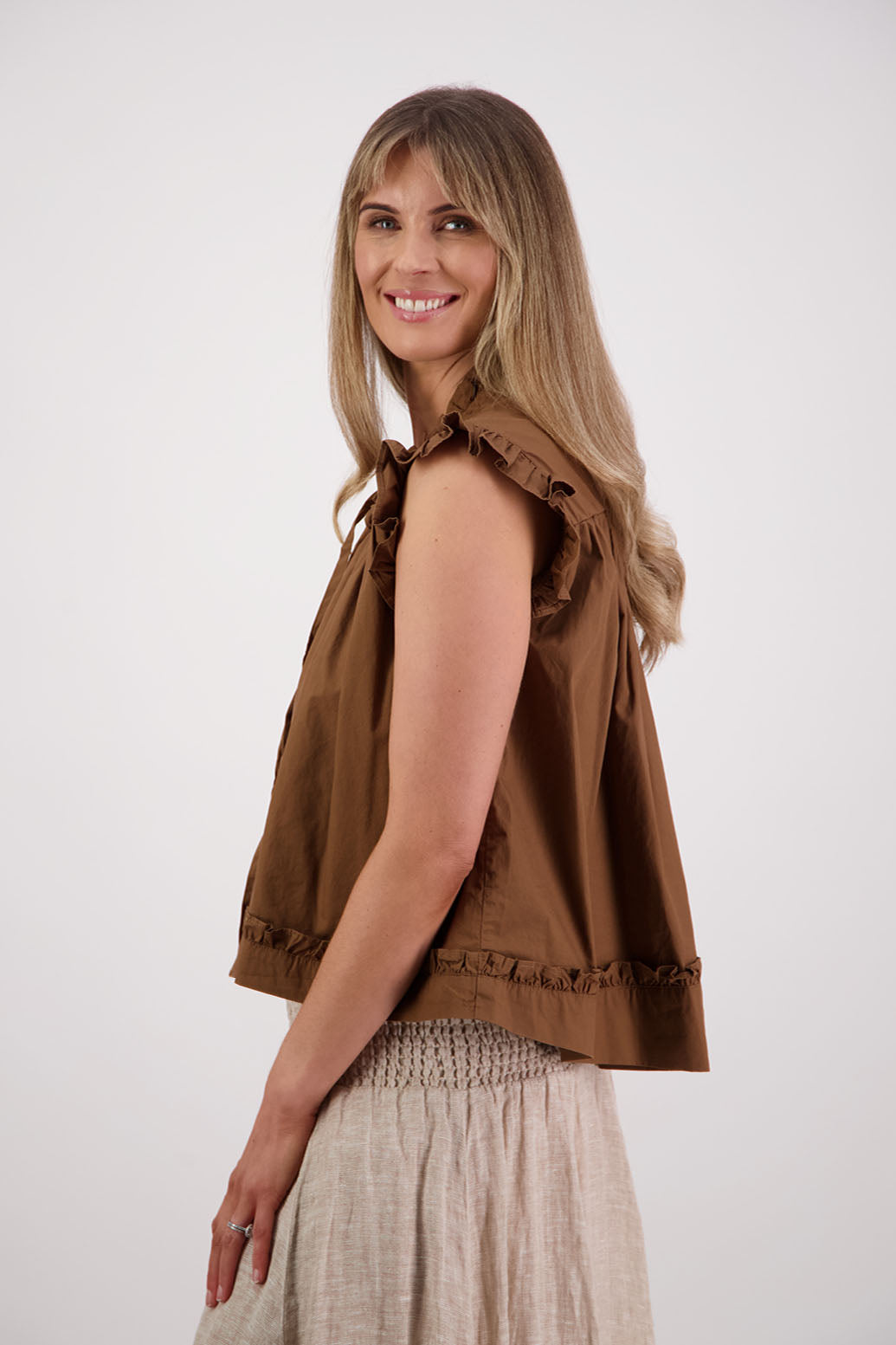 Womens Tan short sleeve wide top with V neck + tie, and small ruffle on the yolk, hem and sleeves. Briarwood NZ. Cotton Poplin. Skye