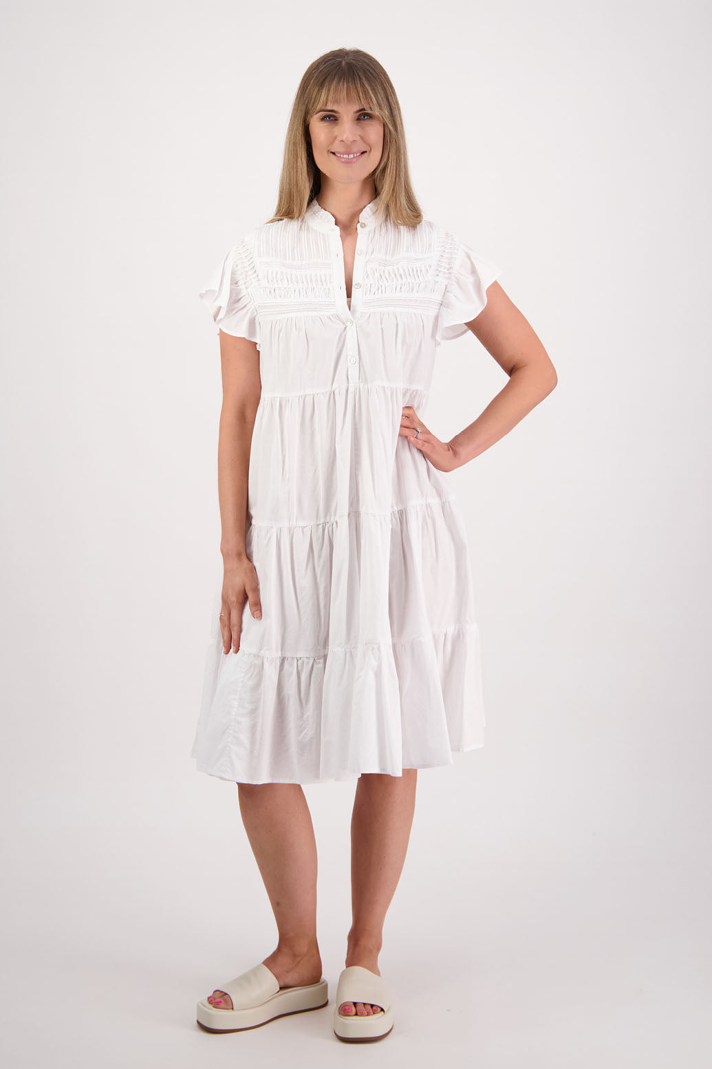 Womens White Cotton Voile dress. Below the knee length, 3-tier dress with ruffle sleeves. Briarwood NZ. Sonia