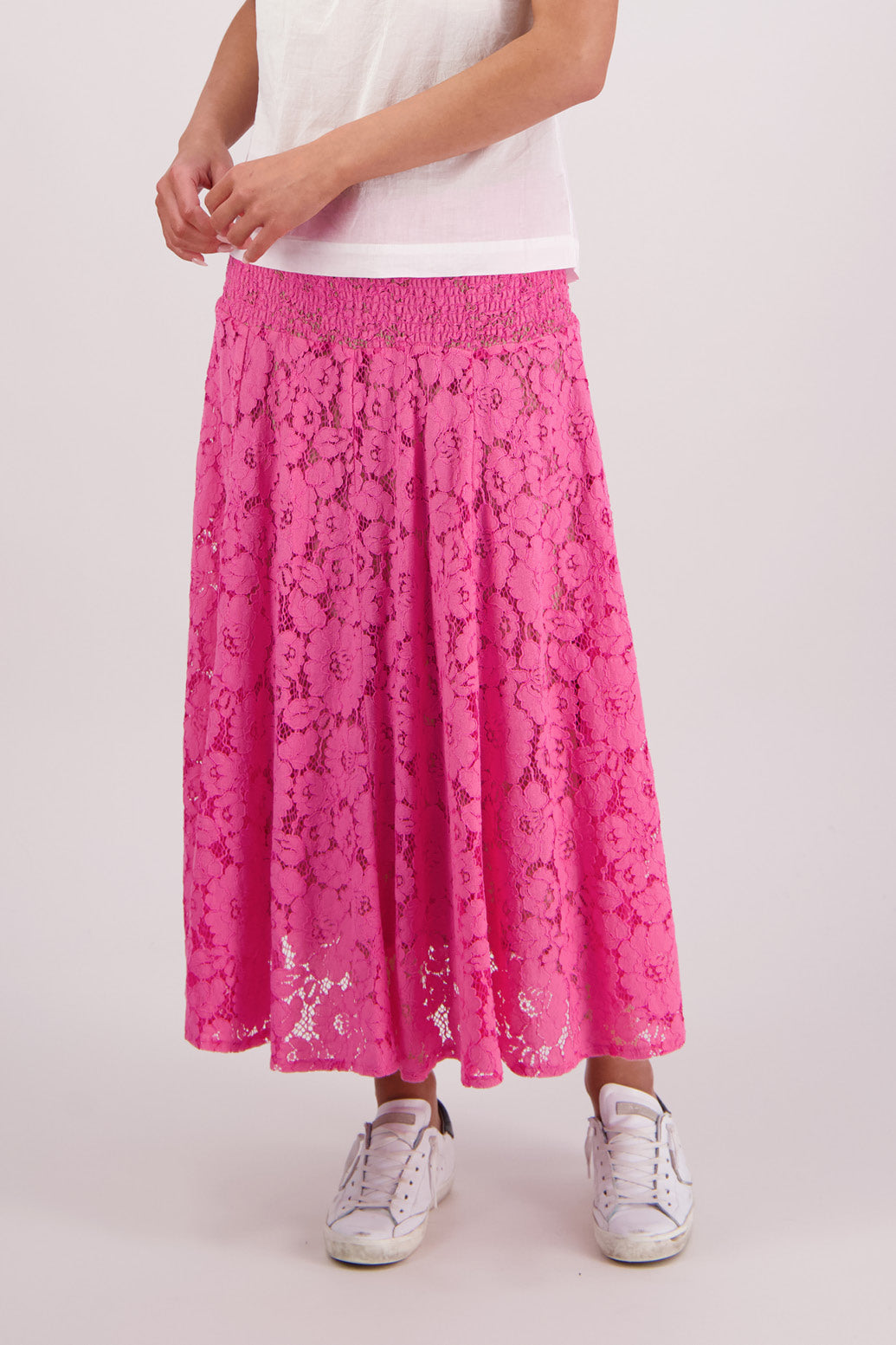 Closeup front view of Briarwood Sparkle skirt in pink lace.