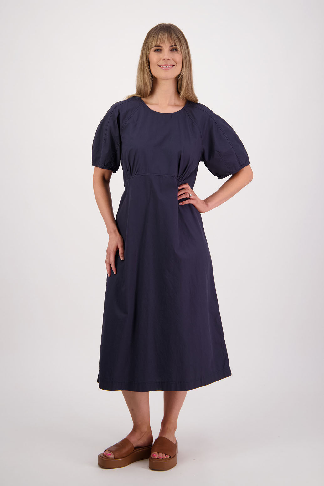 Womens Ink/Navy cotton poplin dress with slight puff sleeves and empire line bodice. Briarwood NZ. Steph