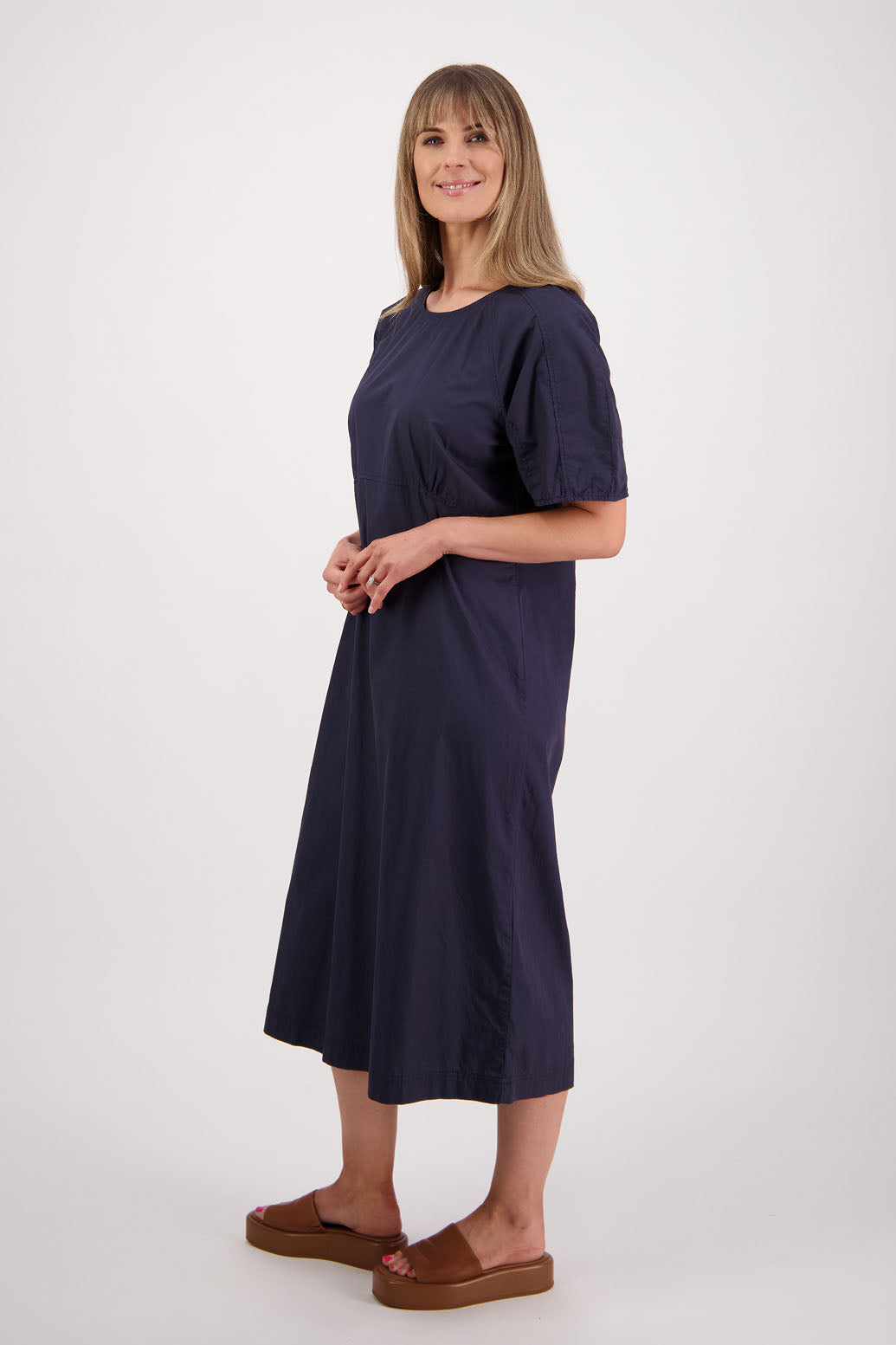 Womens Ink/Navy cotton poplin dress with slight puff sleeves and empire line bodice. Briarwood NZ. Steph