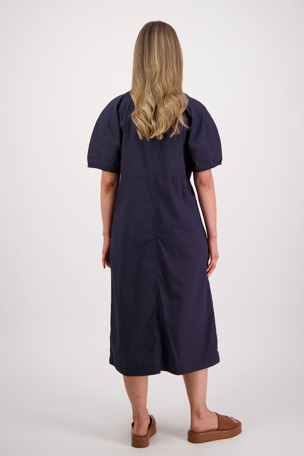 Womens Ink/Navy cotton poplin dress with slight puff sleeves and empire line bodice. Briarwood NZ. Steph