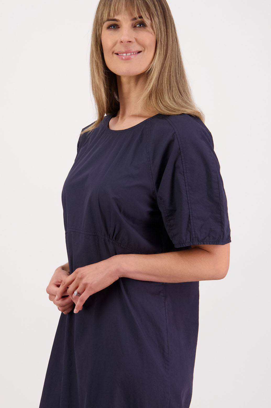 Womens Ink/Navy cotton poplin dress with slight puff sleeves and empire line bodice. Briarwood NZ. Steph
