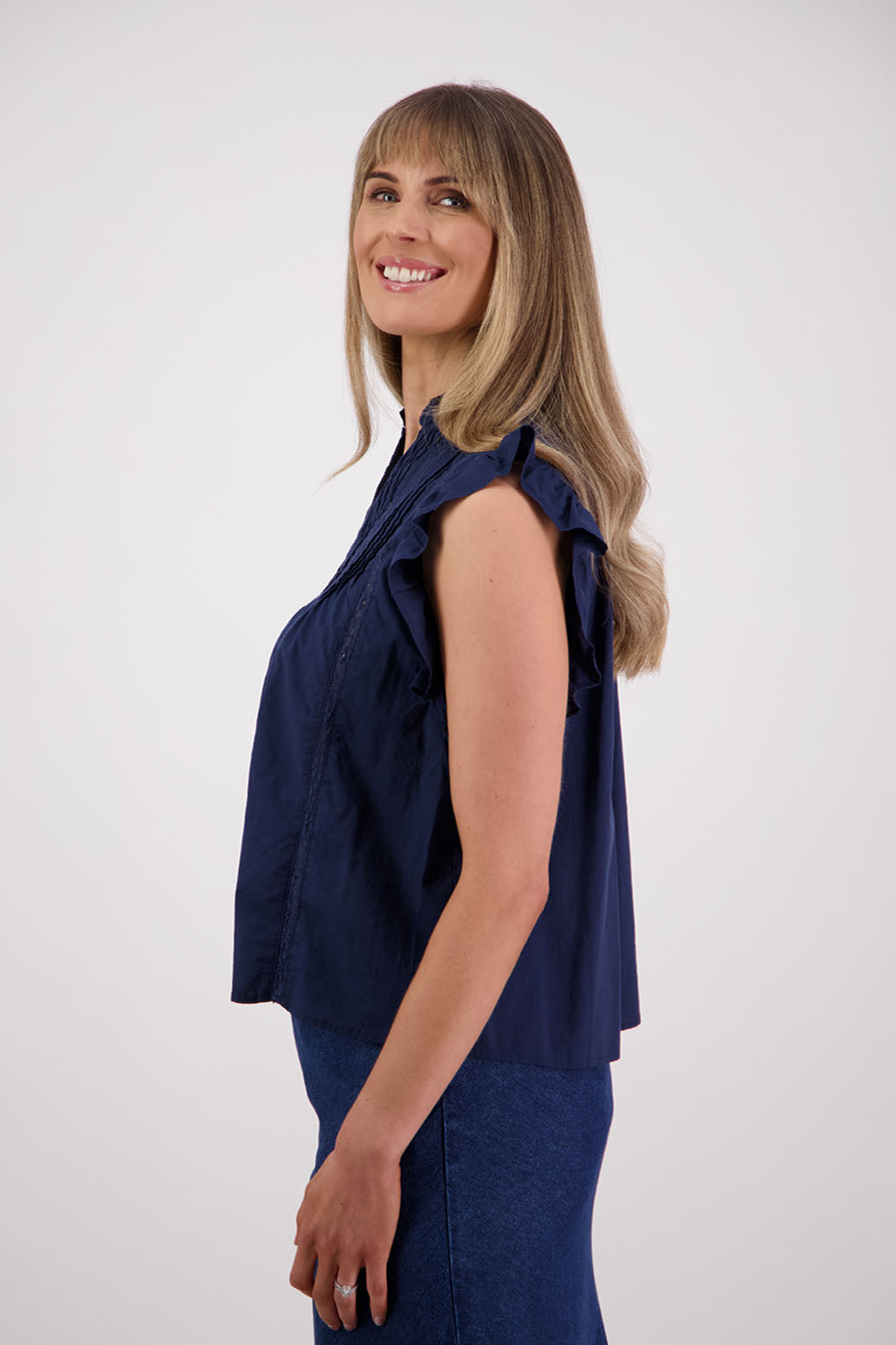 Womens ink boho top with lace panels, pin tucks and signature ruffles over the shoulder. Briarwood NZ. Cotton Voile. Susan