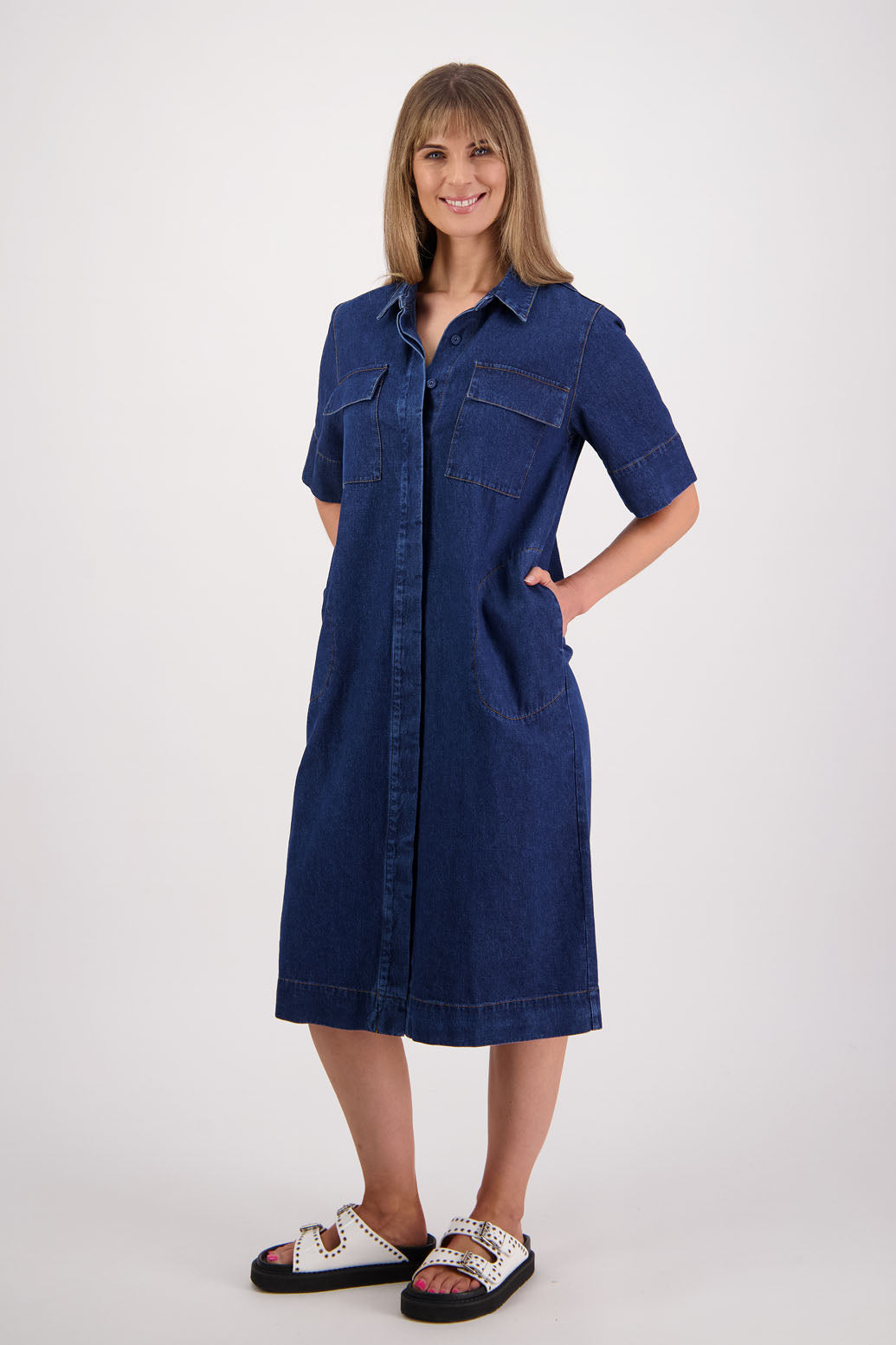 Womens Denim Dress with stitched on pockets, patch pockets and covered buttons. Straight skirt. Briarwood NZ
