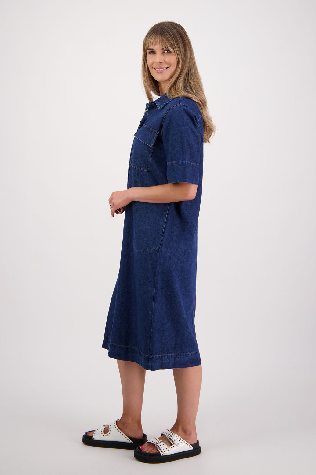 Womens Denim Dress with stitched on pockets, patch pockets and covered buttons. Straight skirt. Briarwood NZ