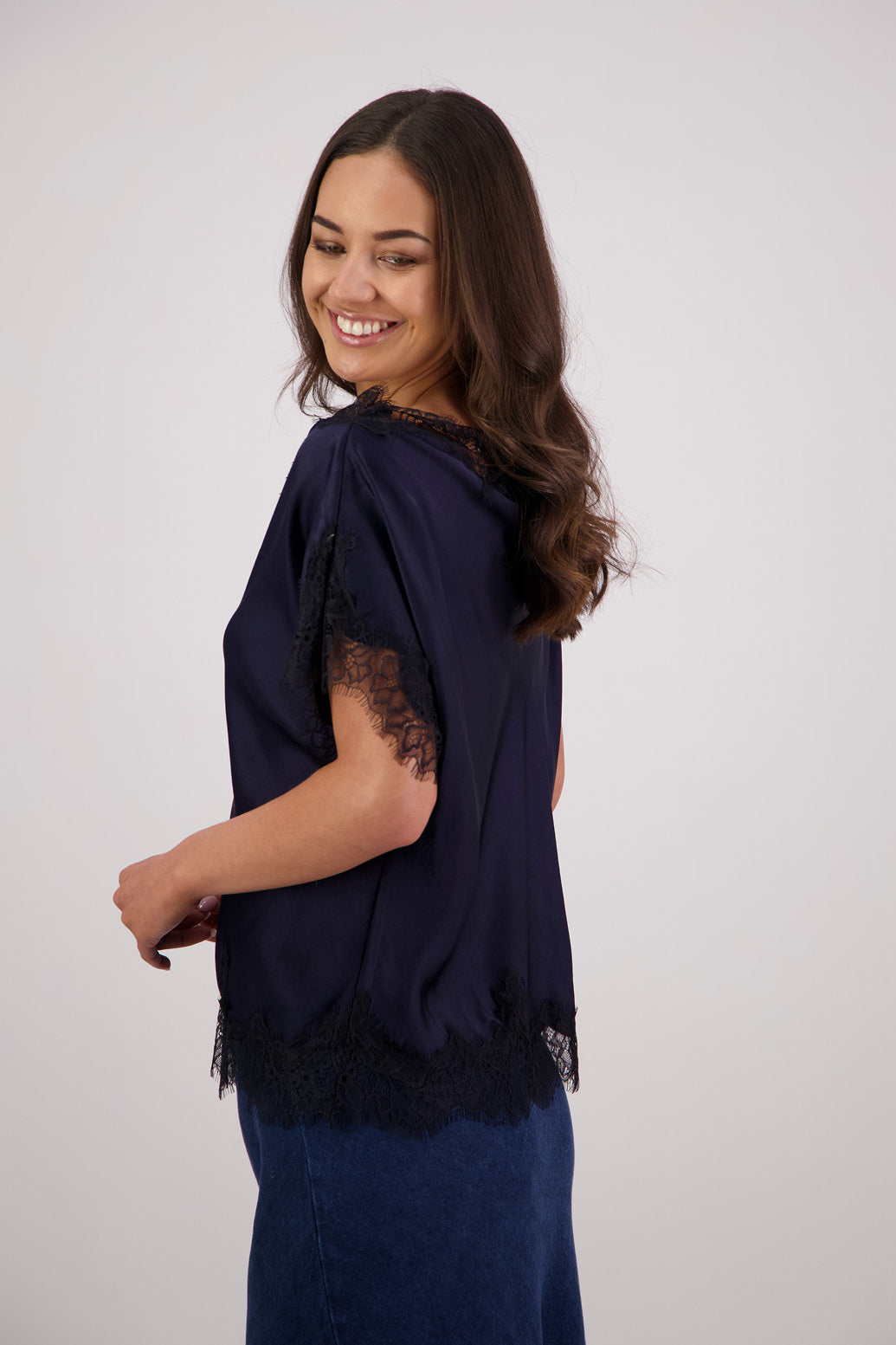Side view Briarwood Tabby Top in ink, 100% viscose with black lace trims.