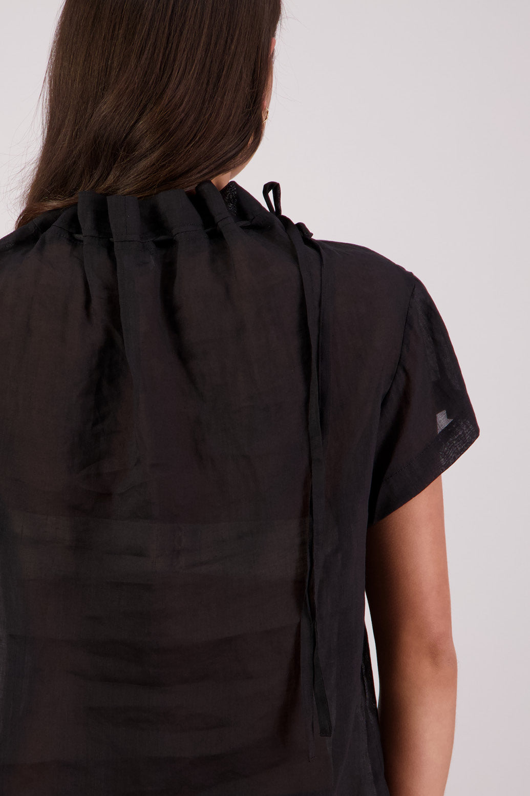 Closeup back view Briarwood Taffy Top in Black.