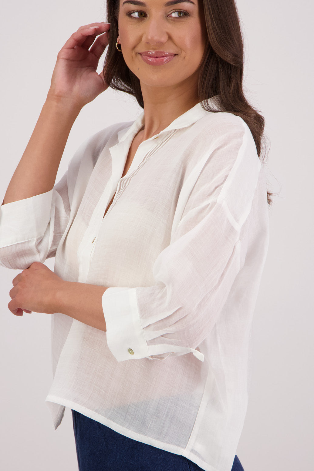 Closeup side view Briarwood Taj Shirt in White.