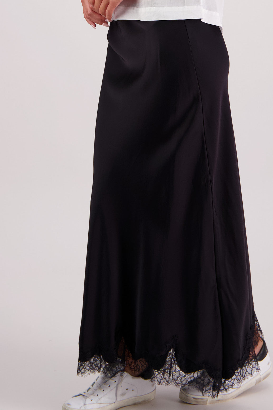 Closeup view of lace hem  Briarwood Tallulah Black Skirt with Black Lace Trim.