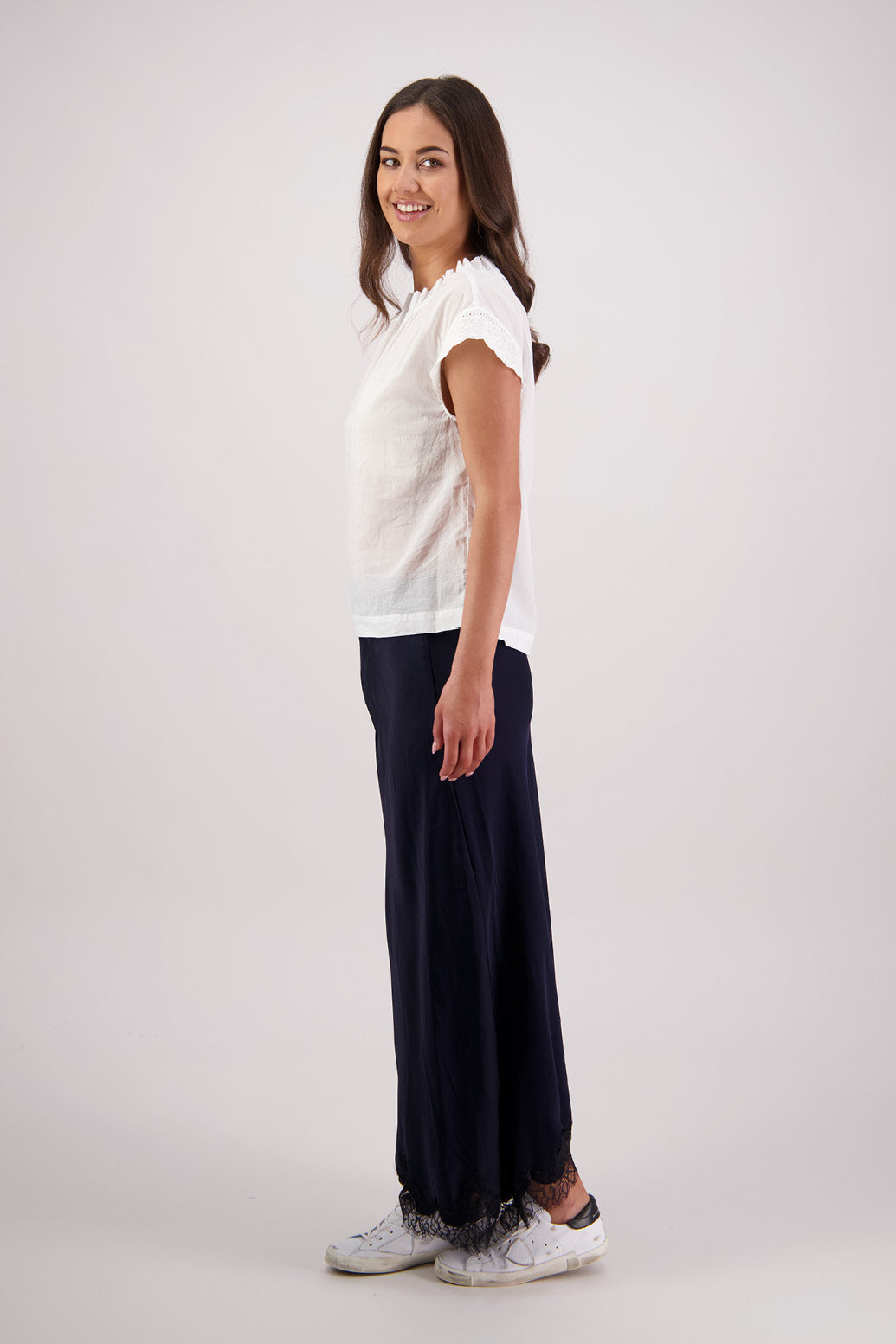 Side view Briarwood Tallulah skirt in ink with black lace trim.