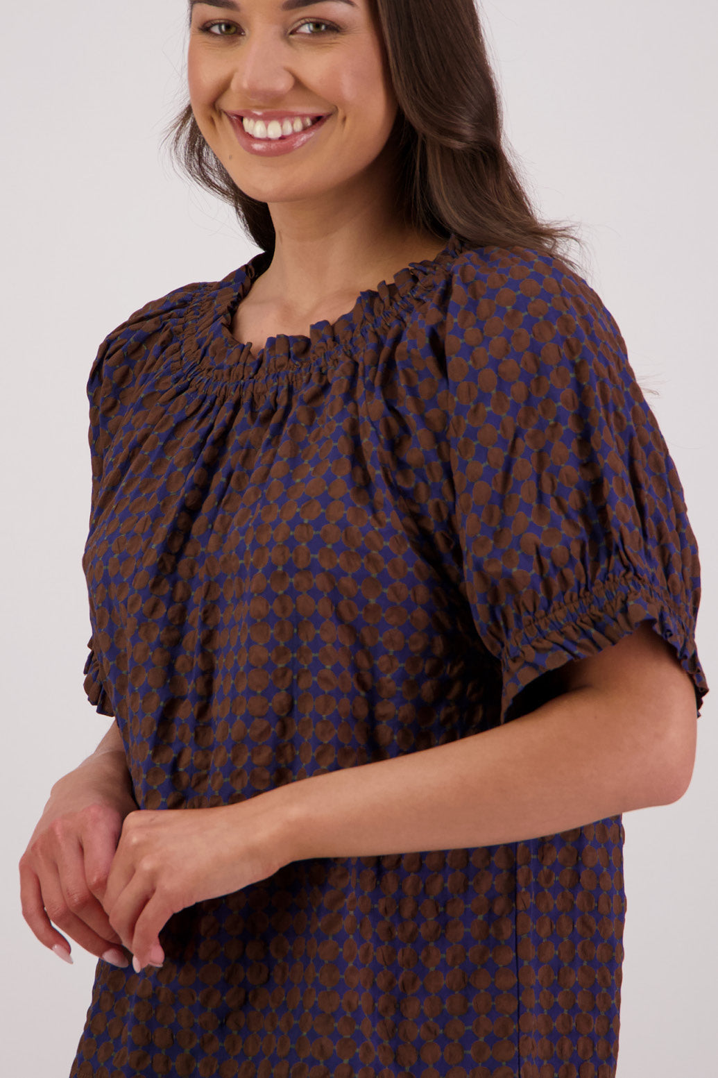 Closeup side view Briarwood Tammy Top in Brown/Ink print.