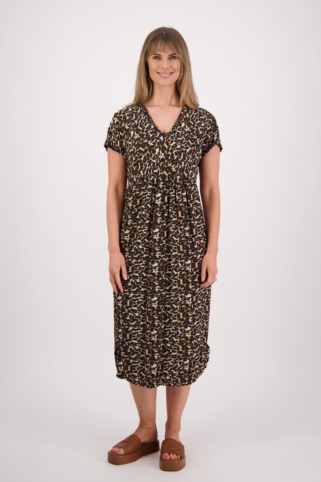 Womens midi dress with bias cut bust and v neck, straight skirt, shaped hem and ruffles around neck, sleeves and hem. Briarwood NZ. Viscose. Taylor. Leopard print