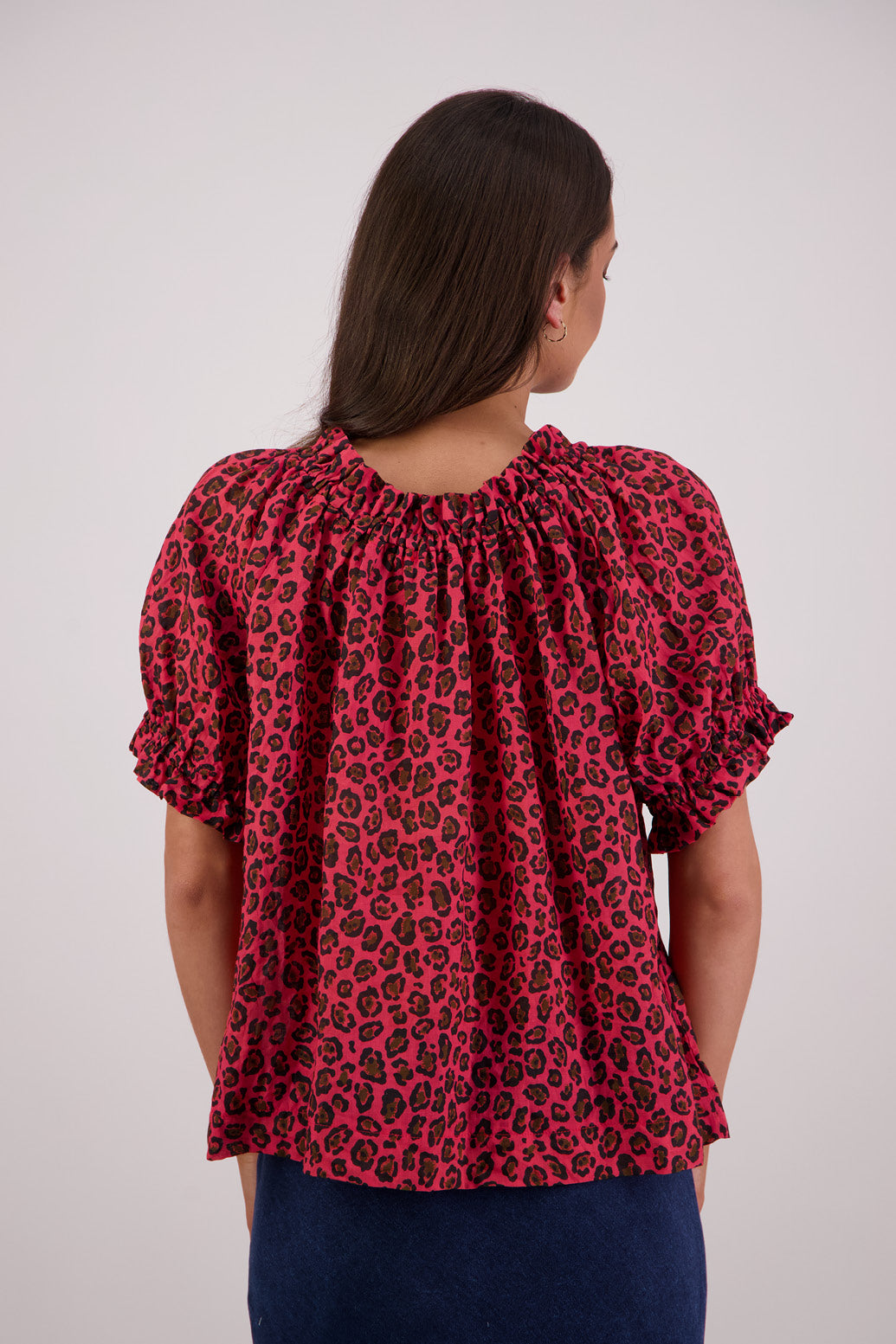 Back view of Briarwood Teddy Top in red animal print.