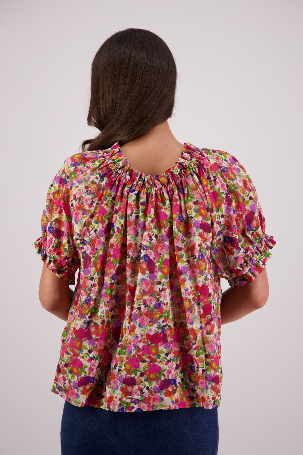 Back view of Briarwood Teddy Top in bright floral print.