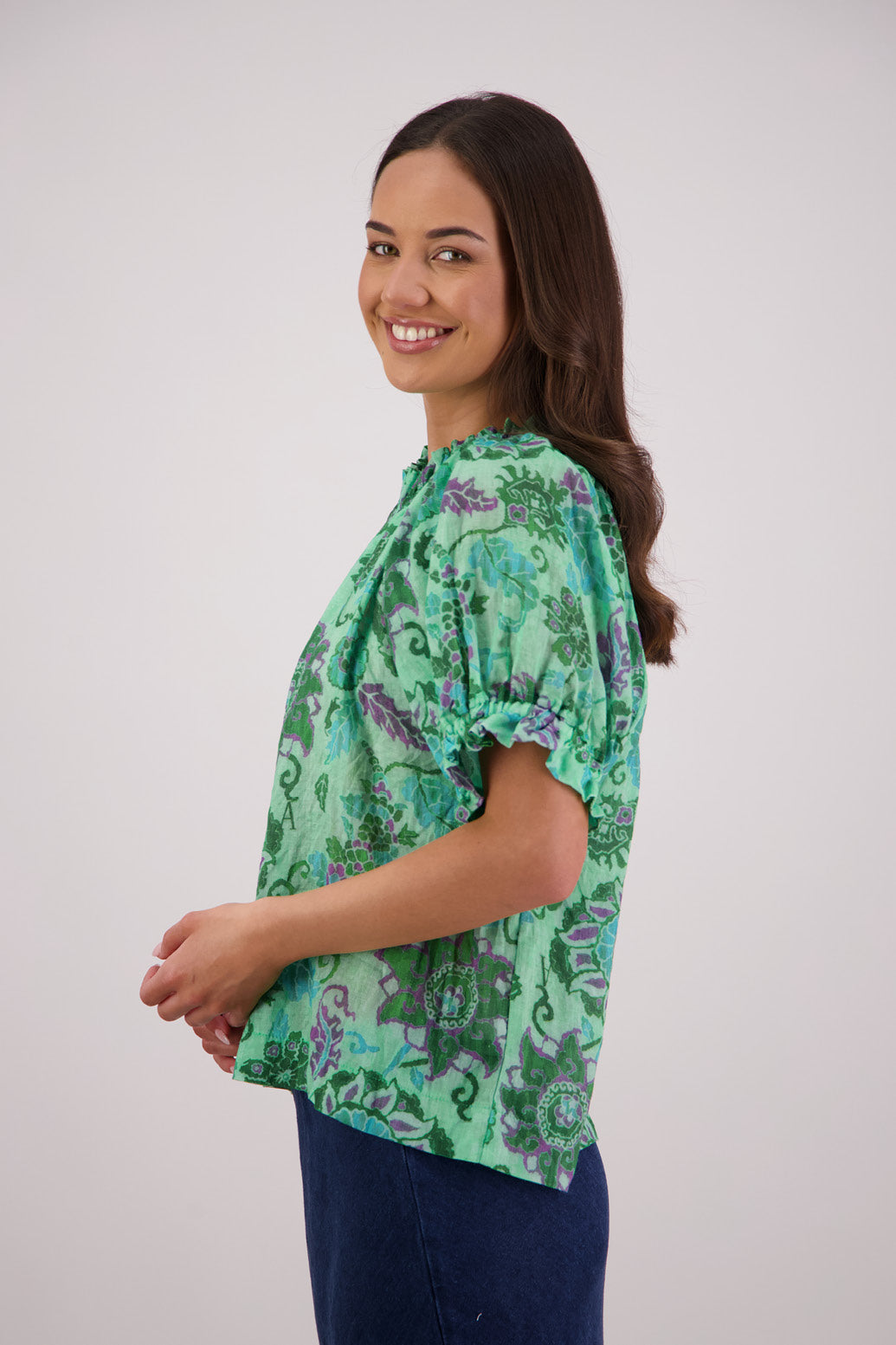 Side view of Briarwood Teddy Top in green floral print.