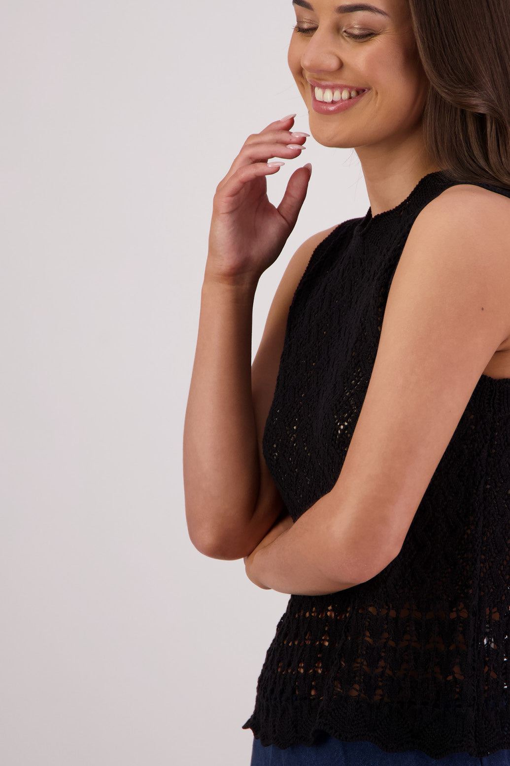 Closeup side view Briarwood Temple Sleeveless Top in Black.