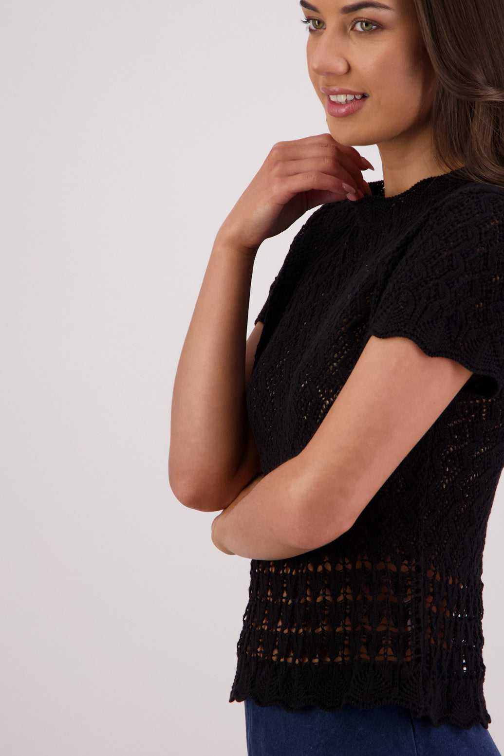 Closeup side view Briarwood Templeton Black Knit Top.