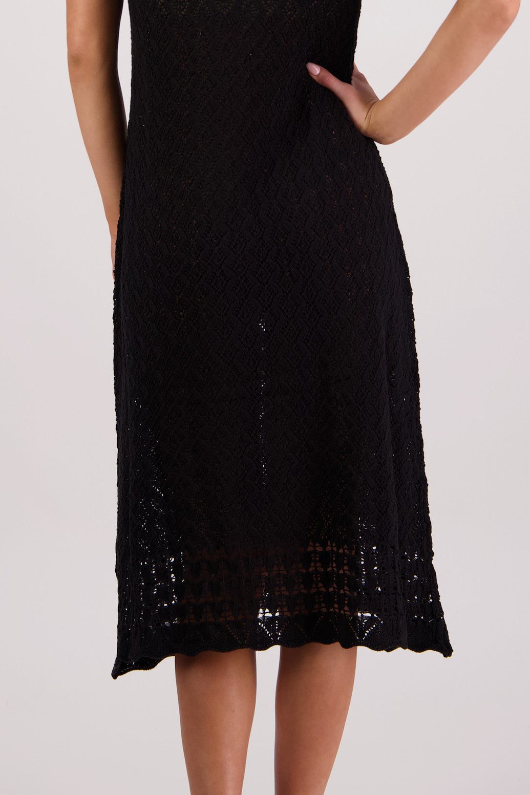 Closeup hem view Briarwood Tennyson Knit Dress in Black.