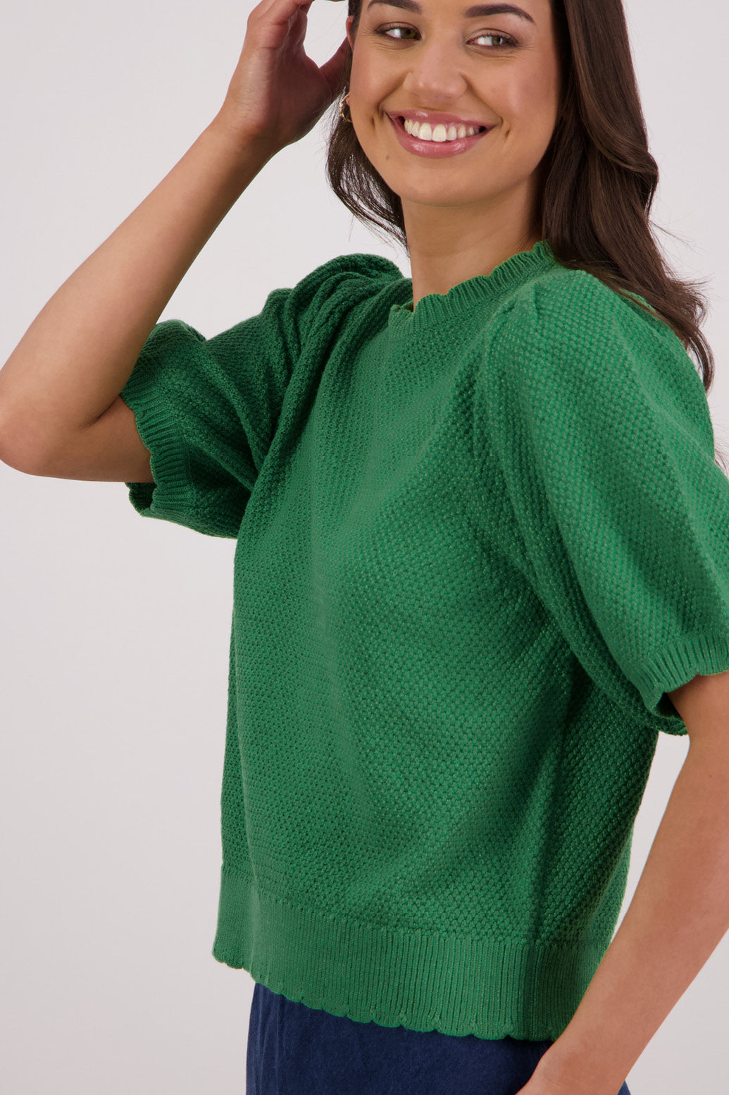 Closeup side view Briarwood Tiger Knit Top in Green.