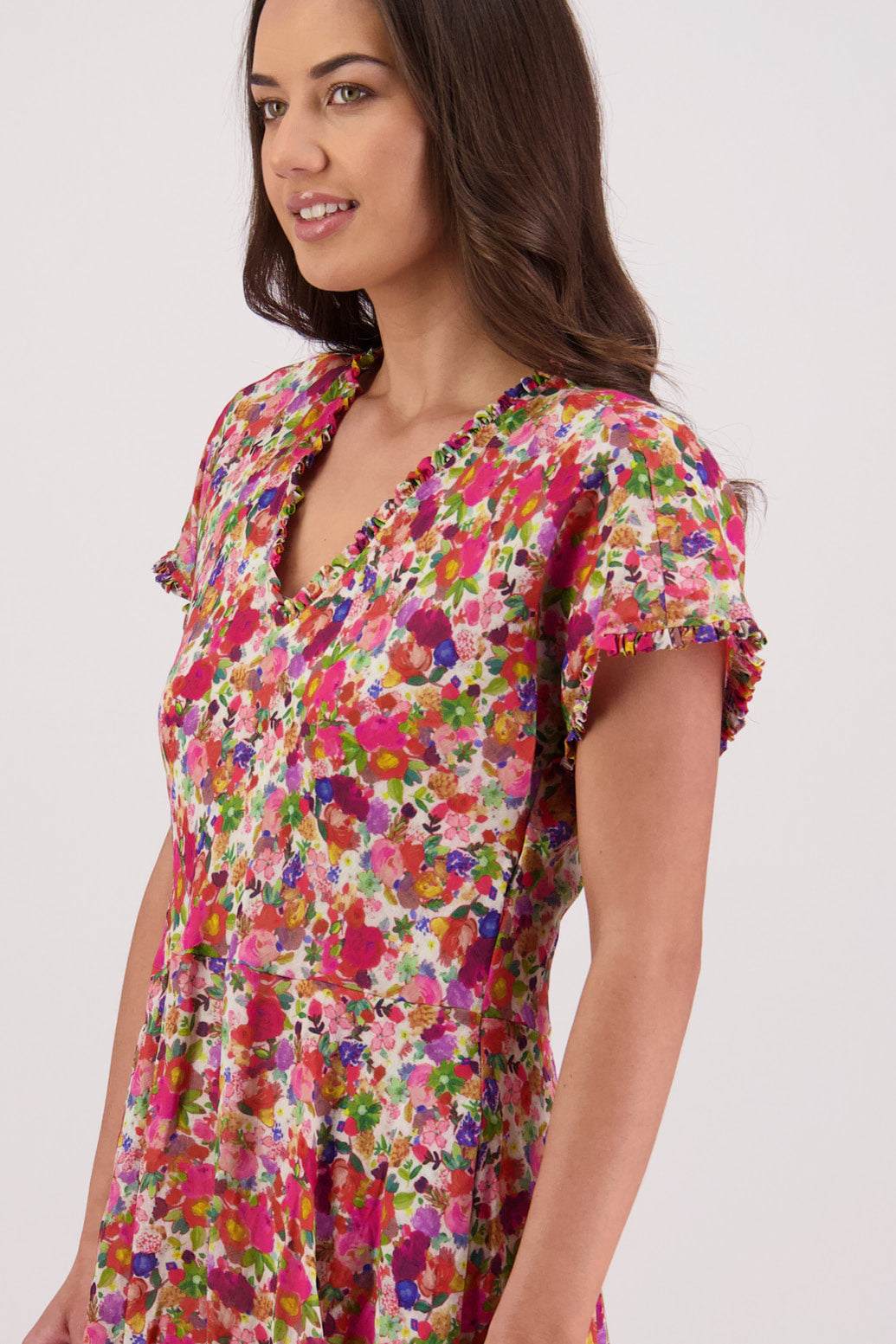 Close up of side view of Briarwood Tori Dress in Bright Floral print.