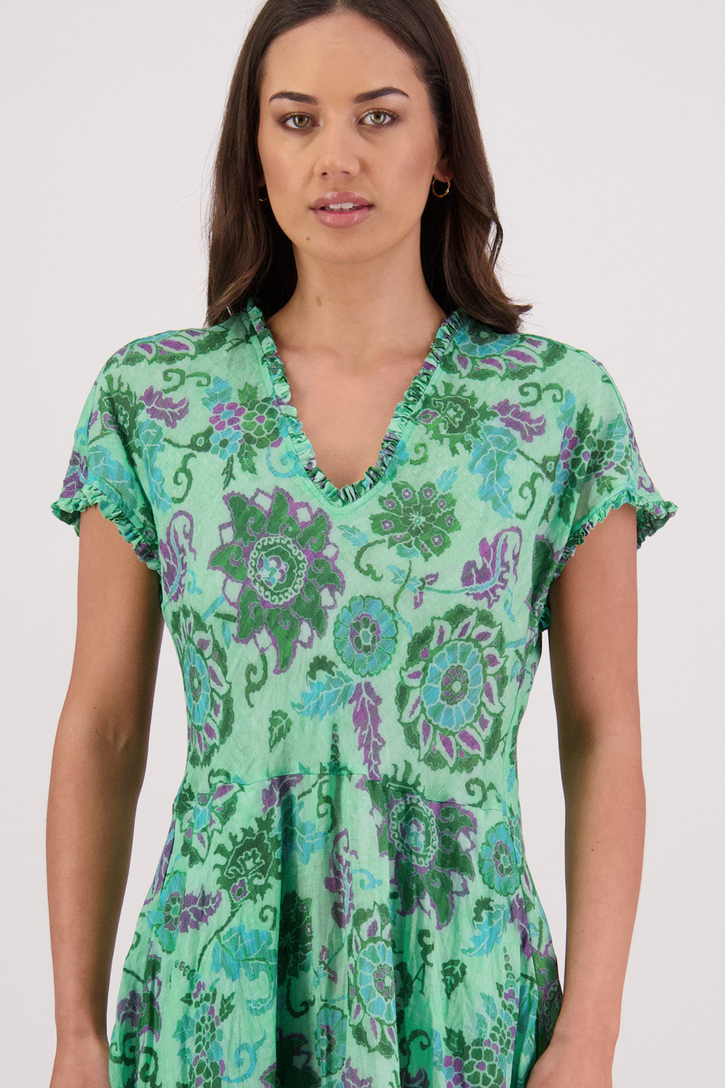 Close up of front view of Briarwood Tori Dress in Green Floral print.