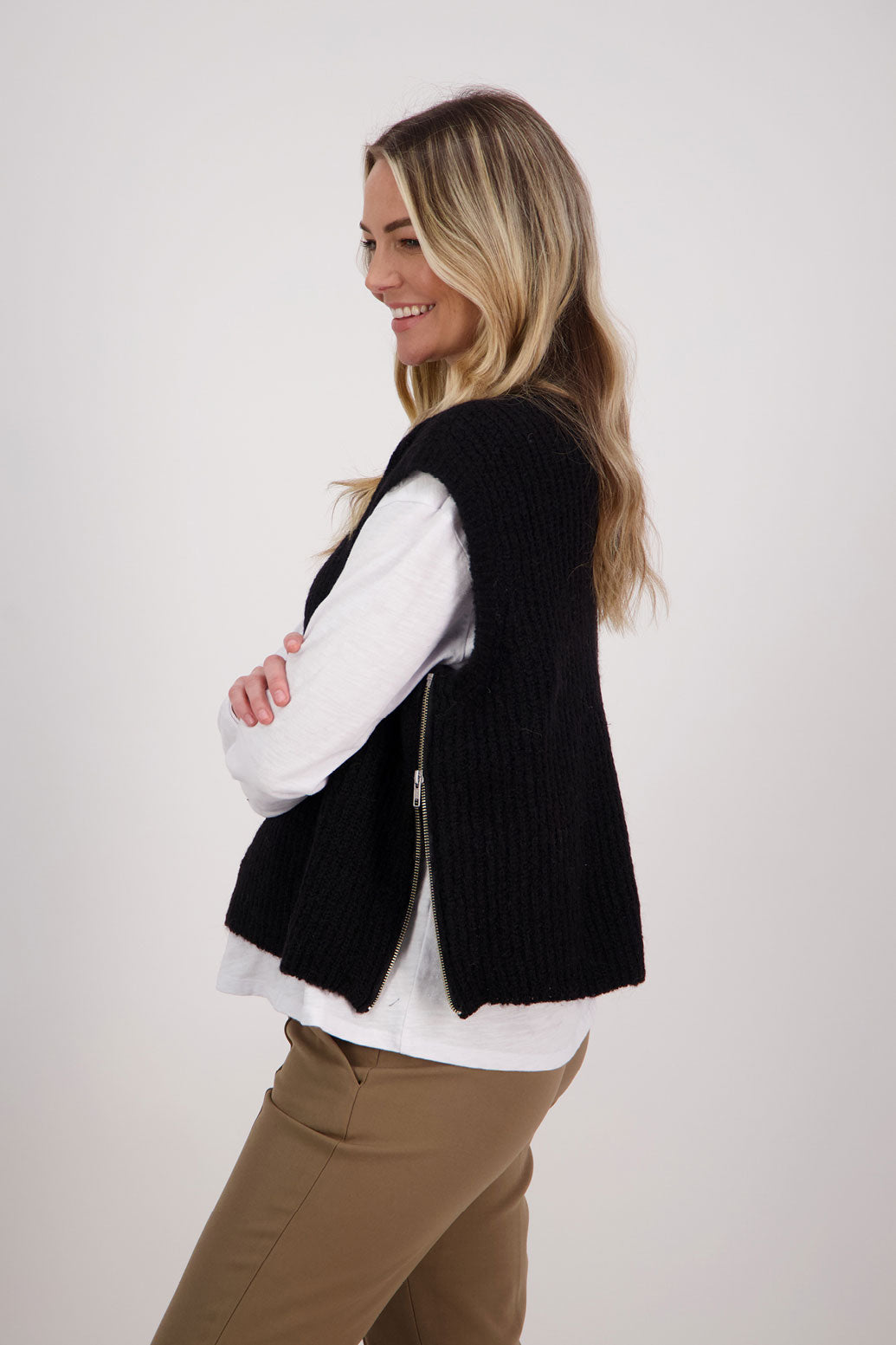 Black sleeveless Mohair/Wool Blend knit vest. High neck and side zip. Vickie