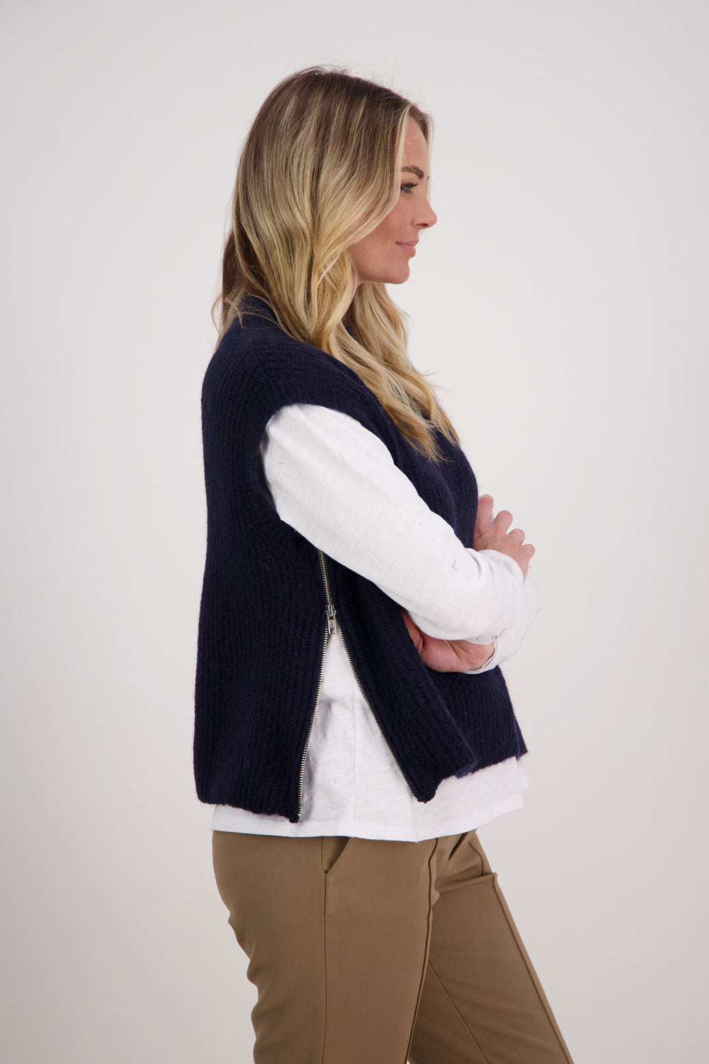 Ink/Dark Blue sleeveless Mohair/Wool Blend knit vest. High neck and side zip. Vickie