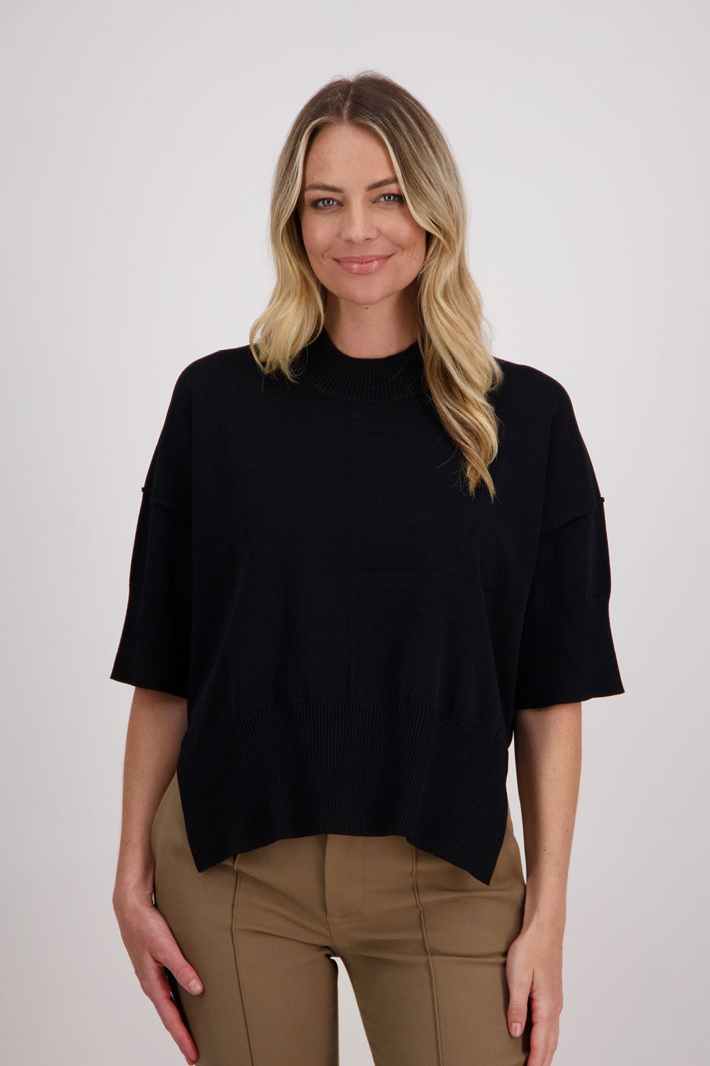 Vinnie black knit top. 3/4 Sleeves, drop shoulder and wide hem with split