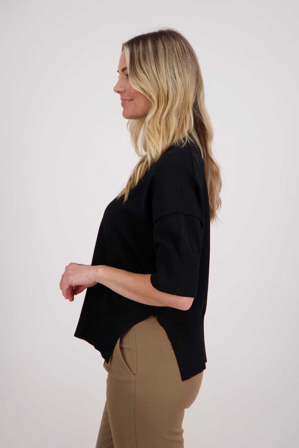 Vinnie black knit top. 3/4 Sleeves, drop shoulder and wide hem with split