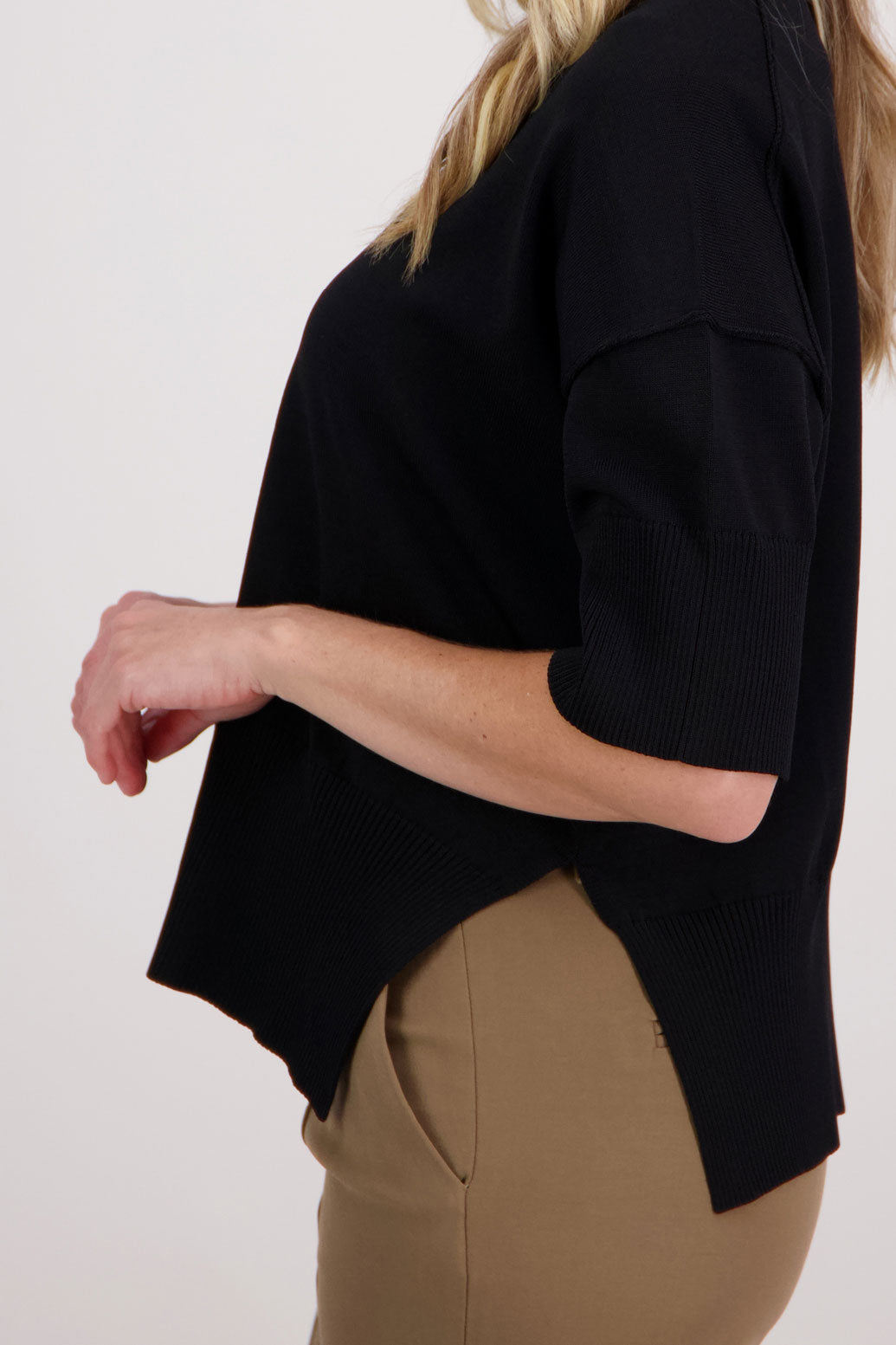 Vinnie black knit top. 3/4 Sleeves, drop shoulder and wide hem with split