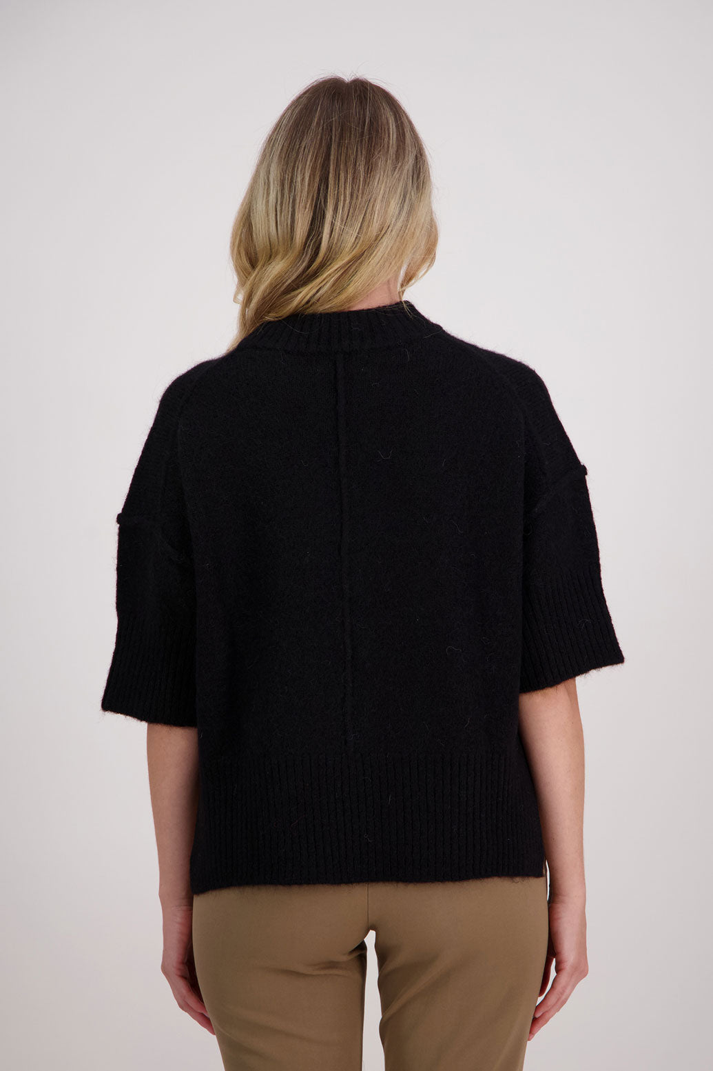 Black Alpaca/Wool blend top with elbow length sleeves and drop shoulder. Virginia