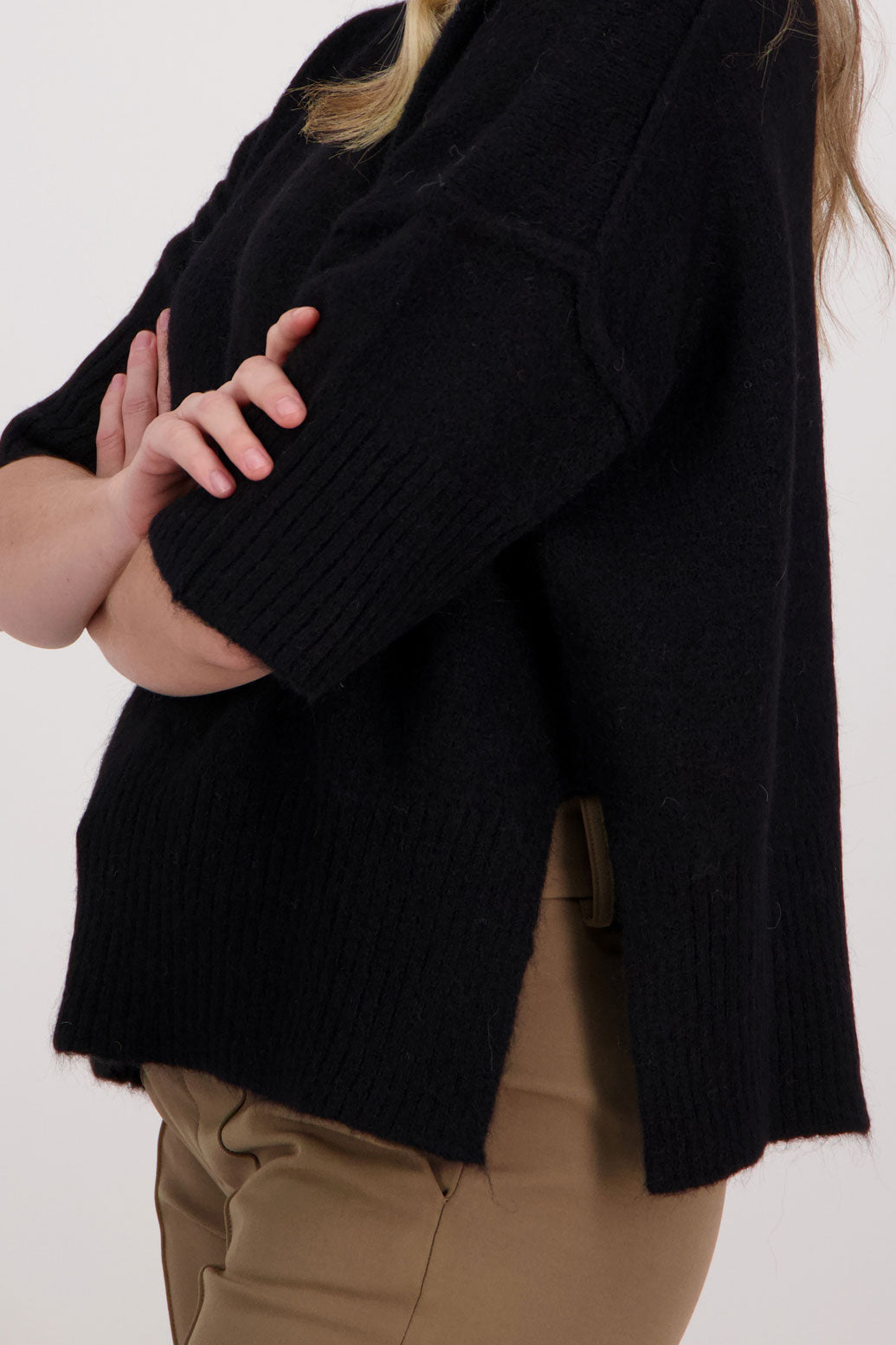 Black Alpaca/Wool blend top with elbow length sleeves and drop shoulder. Virginia