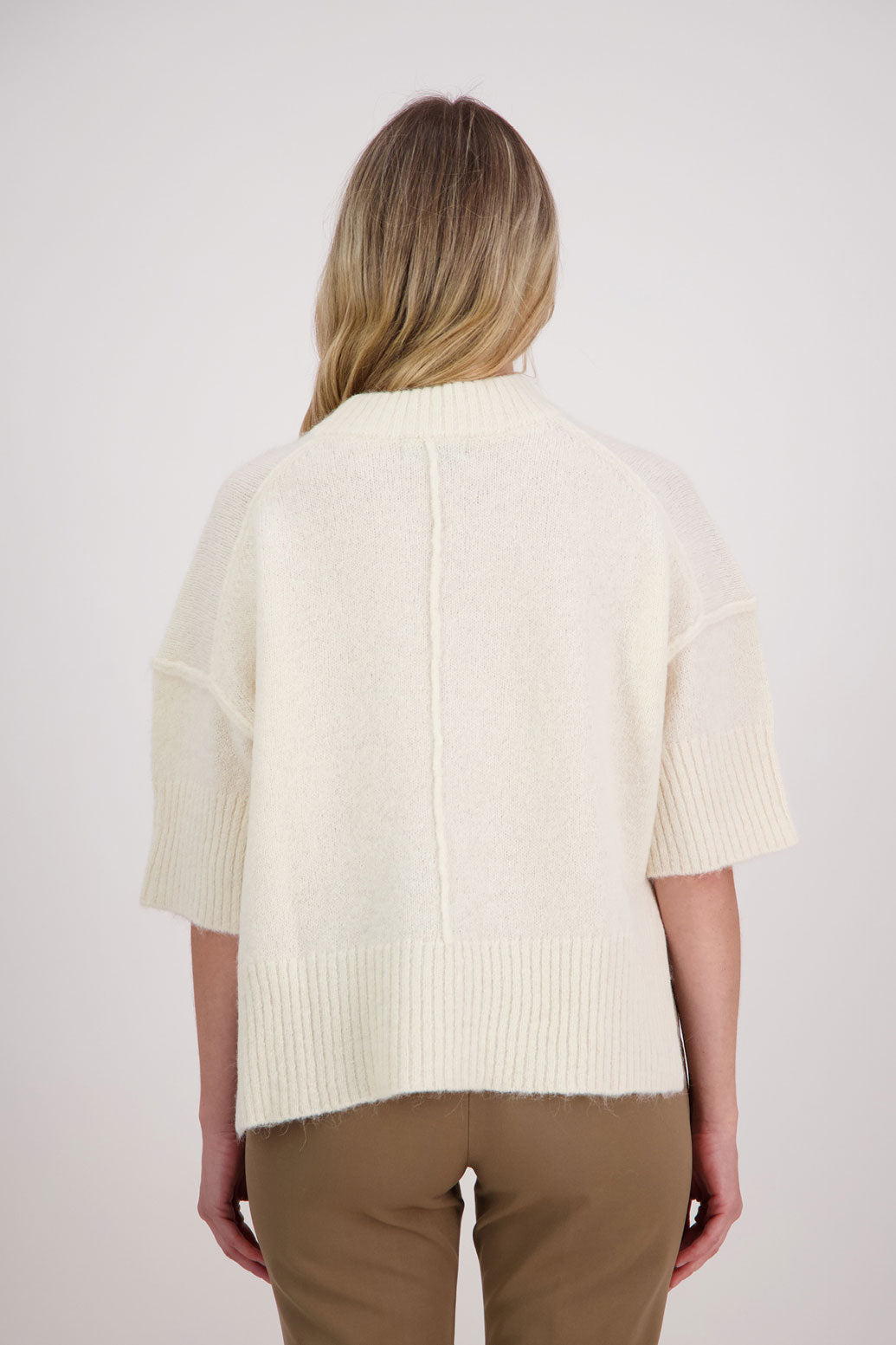 Ivory/White Alpaca/Wool blend top with elbow length sleeves and drop shoulder. Virginia